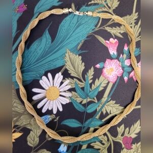 Vintage Sarah Coventry twisted gold tone necklace.